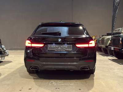 BMW Serie 5 520d d 48V xDrive Touring Msport Nero usata Bologna