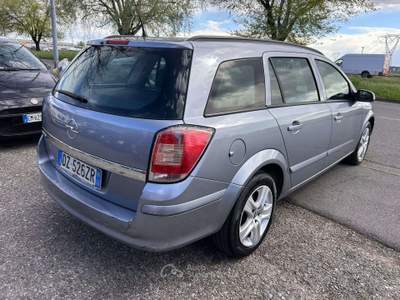 Opel Astra Benzina III 2010 SW SW 1.6 Cosmo 115cv Grigio usata Inzago