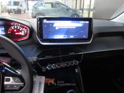 Peugeot 208 1.2 PureTech 100cv Business KMZERO Grigio usata Rho