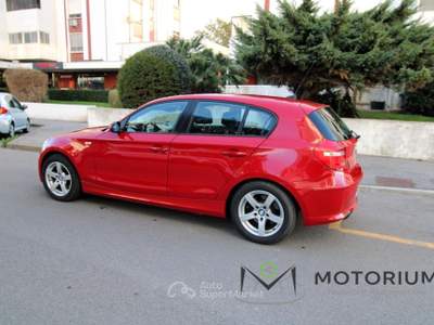 BMW Serie 1 135i d cat 5 porte Futura DPF Rosso usata Oristano