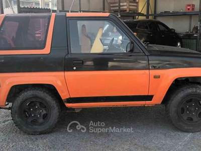 Daihatsu Feroza 1.6 Resin-top MOTORE ROTTO Arancione usata Cigognola