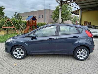 Ford Fiesta 1.4 5p. Bz.- GPL Titanium UNICO PROPRIETARIO Arancione usata Cigognola