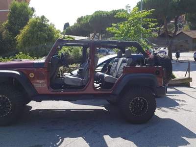 Jeep Wrangler Unlimited 2.8 CRD Sahara Auto Rosso usata Roma
